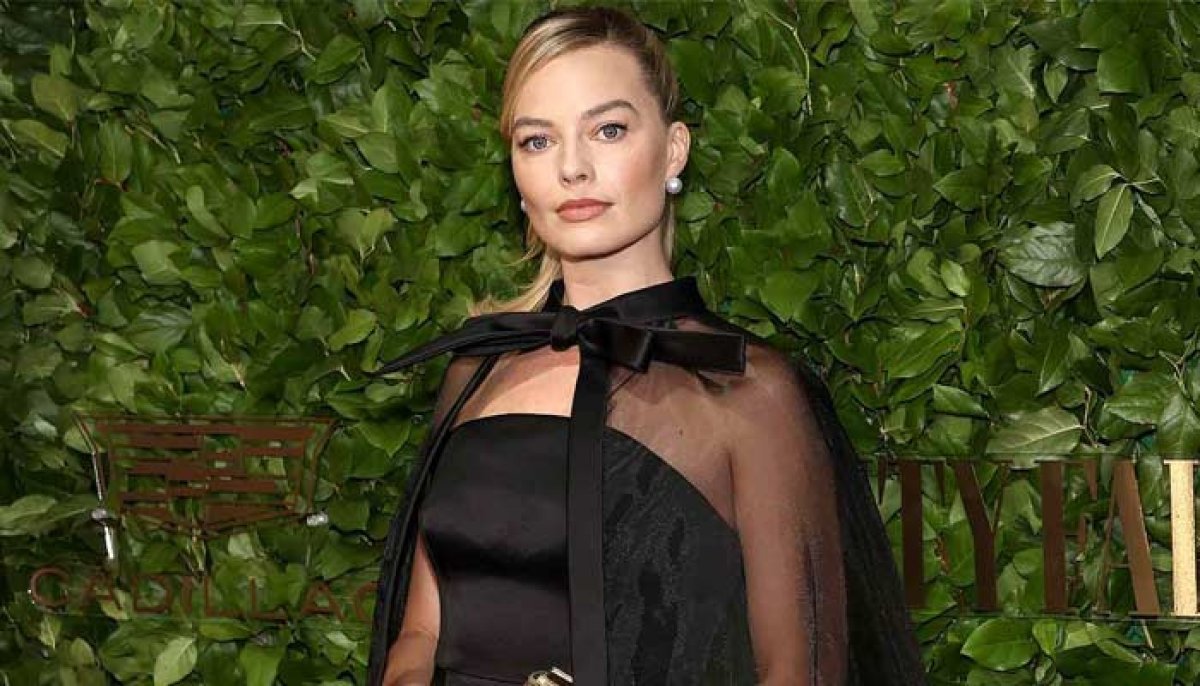 Margot Robbie dazzles in black at pre-BAFTA party