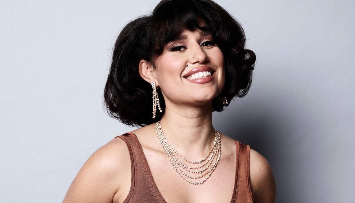 How did RAYE confront years of pain in 2026 album?