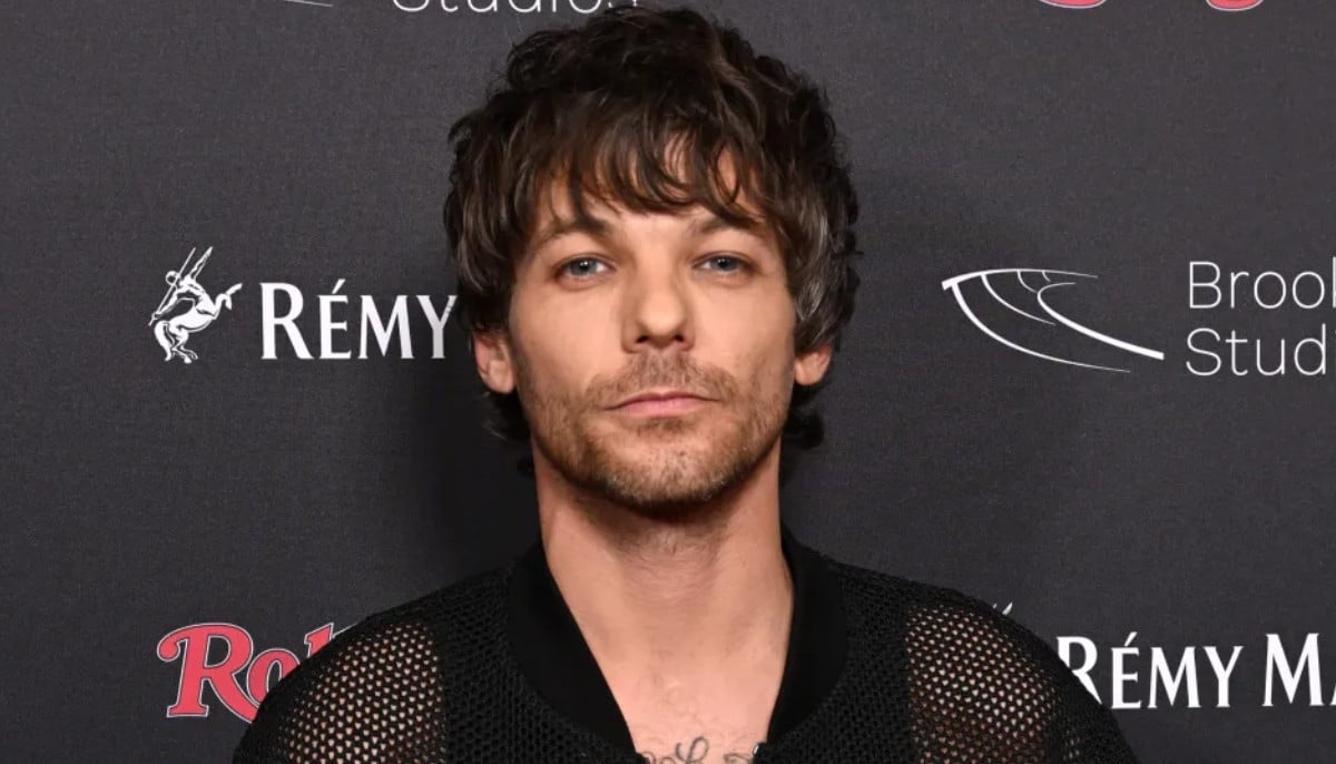 Louis Tomlinson goes against management, supports fans