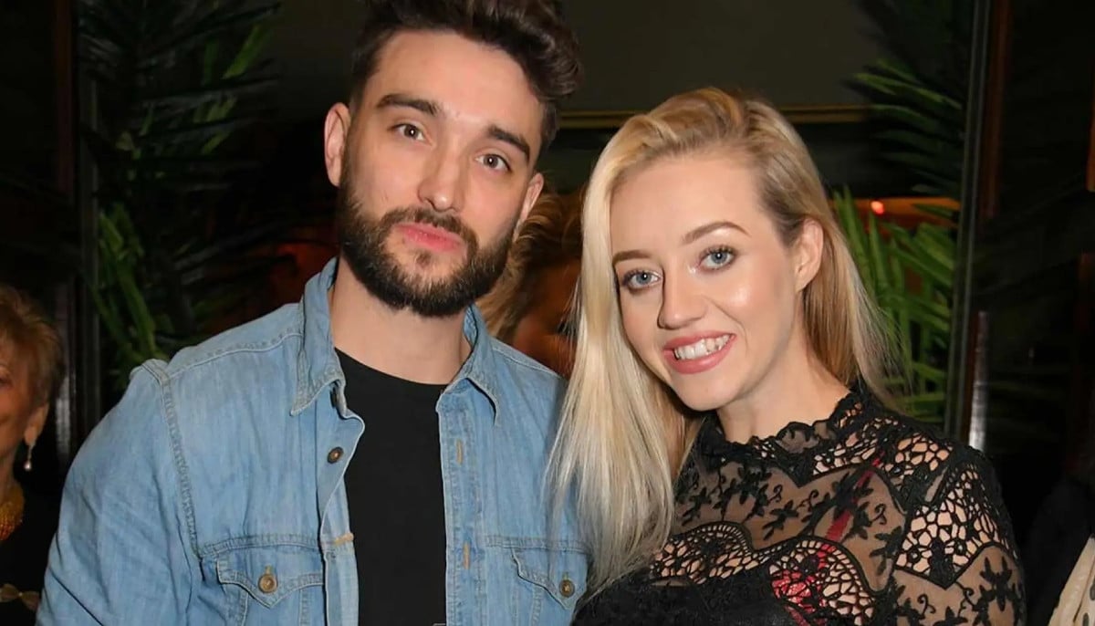 Tom Parker's widow Kelsey Parker says passed away singer has sent her 'little gift'