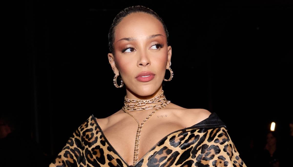 Doja Cat tears up while talking about her cancelled show