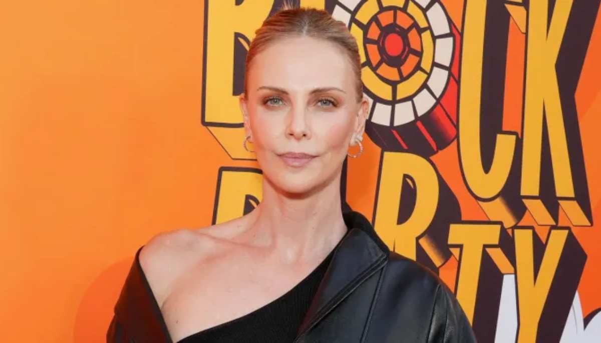Charlize Theron recalls Memento's low budget costume hack 