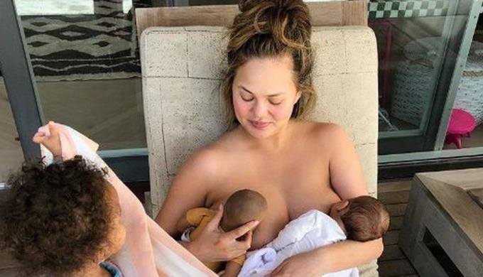 Chrissy Teigen slams trolls mom-shaming her for breast feeding in public