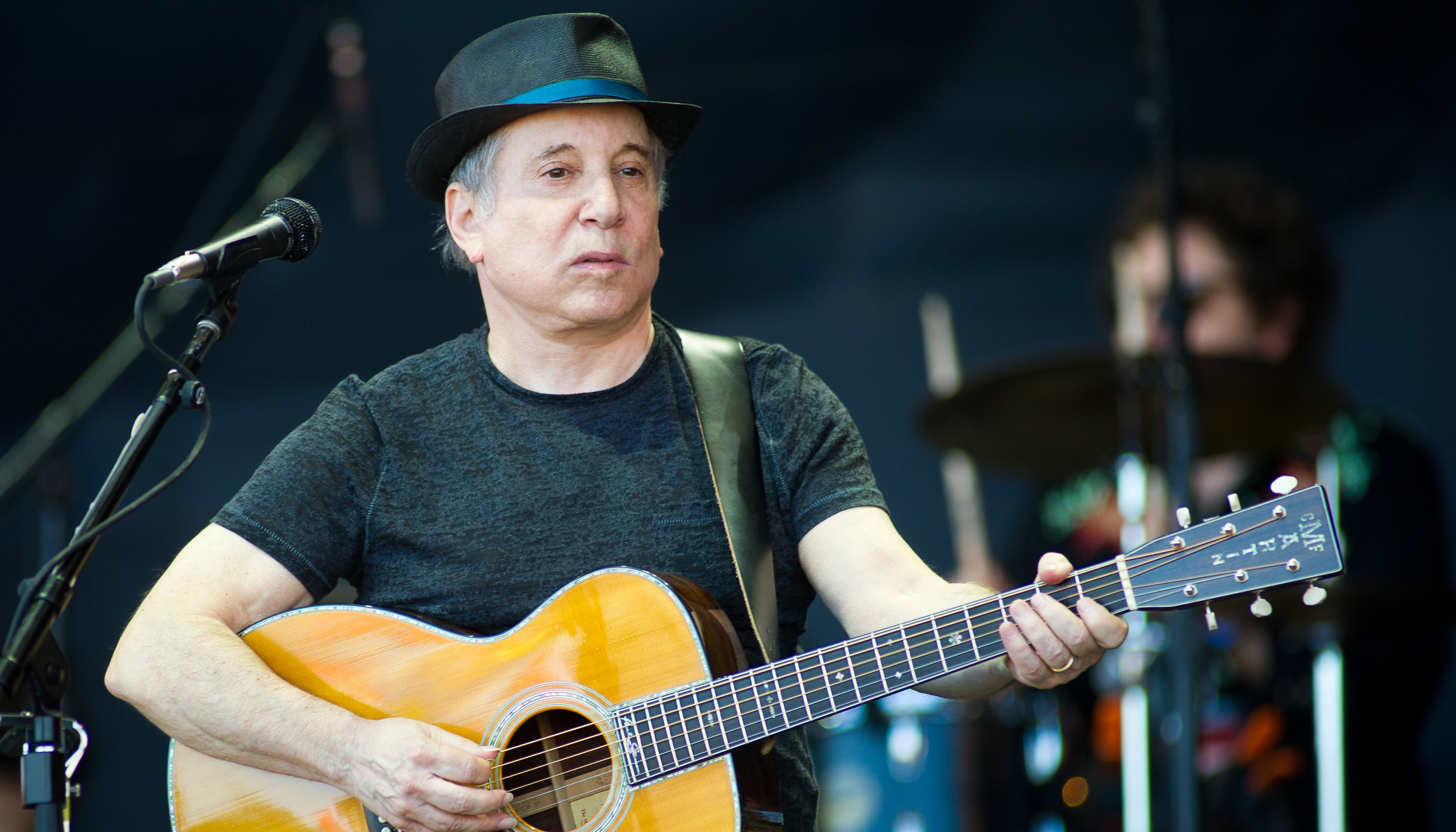Paul Simon charges up crowd with surprise performance at Newport Folk