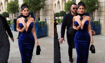 Kylie Jenner turns heads in plunging blue gown 