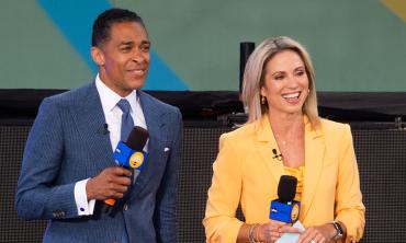T.J. Holmes, Amy Robach couldn't keep hands off each other on work trip: source
