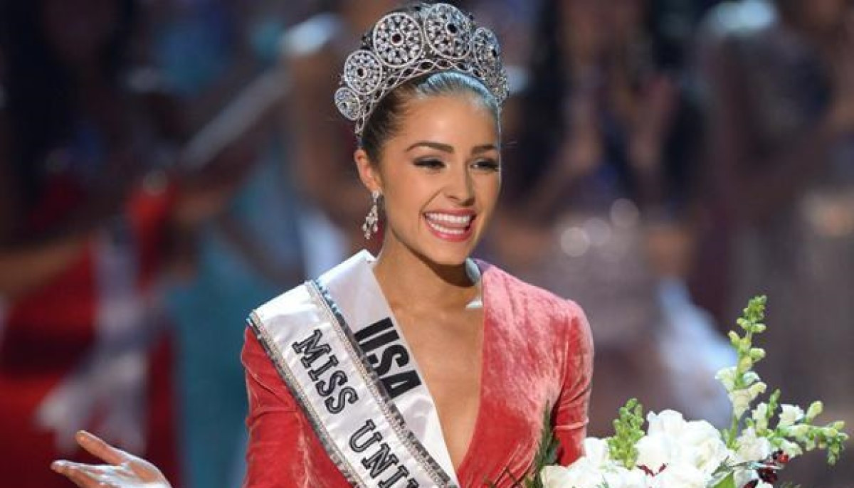 Miss Universe Former title holder Olivia Culpo hides her crown in a