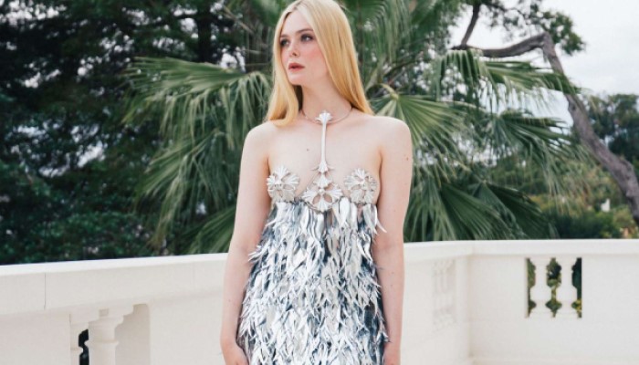 Elle Fanning GLITTERS in silver-tinsel Dress at Cannes Film Festival