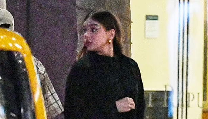 Hailee Steinfeld in a black mini dress during a night out in NYC.