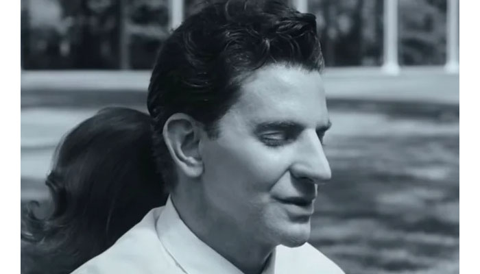 Bradley Coopers prosthetic nose sparks debate in Leonard Bernstein biopic trailer.