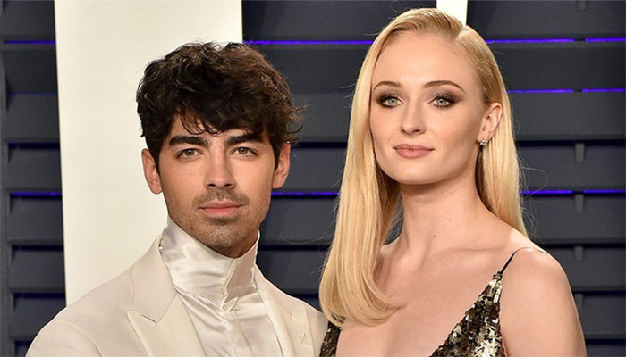 Joe Jonas delivers modified version of love song to Sophie Turner onstage, days after divorce filing.