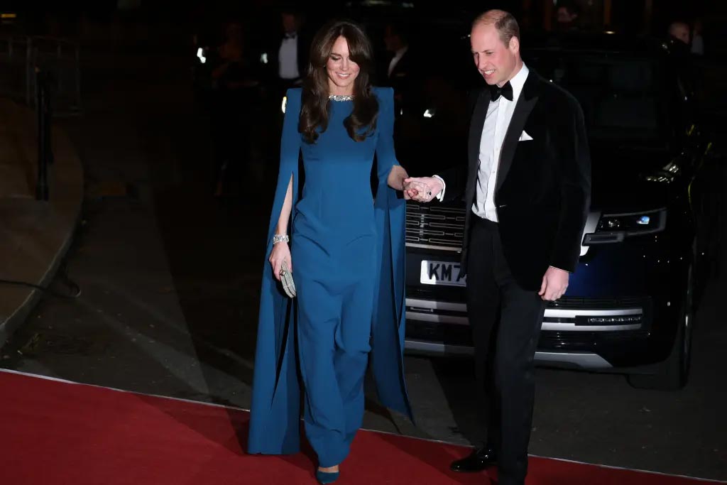 Prince William holding hands with Princess Kate
