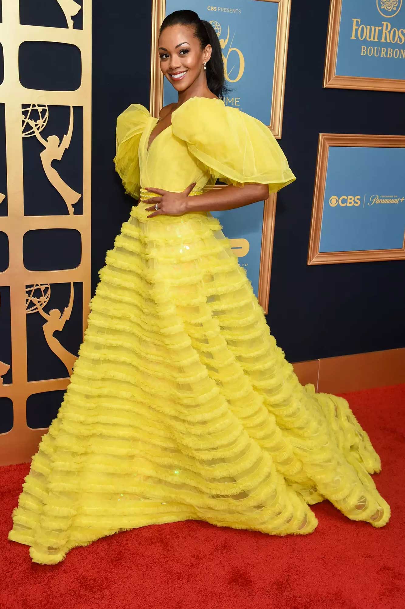 Mishael Morgan lit up the red carpet in a yellow dress