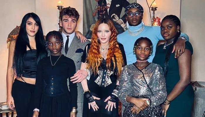Madonna radiates joy while posing with her kids and friends