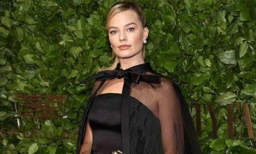 Margot Robbie dazzles in black at pre-BAFTA party