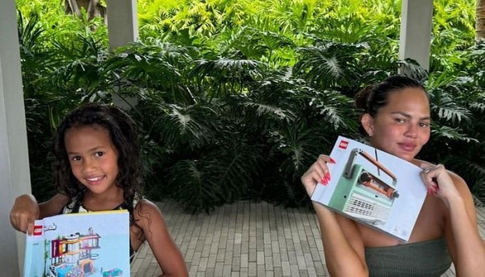 Chrissy Teigen enjoys building Lego sets with her family