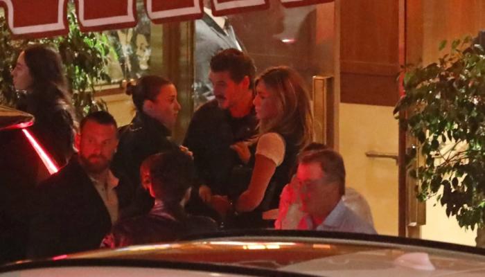 Jennifer Aniston and Pedro Pascal were photographed chatting by the valet at Sunset Tower Hotel recently