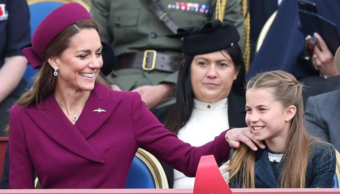 Princess Charlotte was seen leaning in with genuine interest as Princess Kate spoke to a veteran