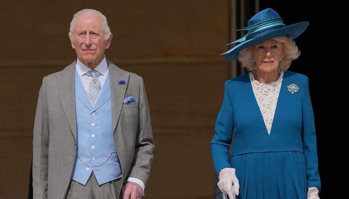 Queen Camilla wows in teal Dior as King Charles hosts garden bash at the Palace