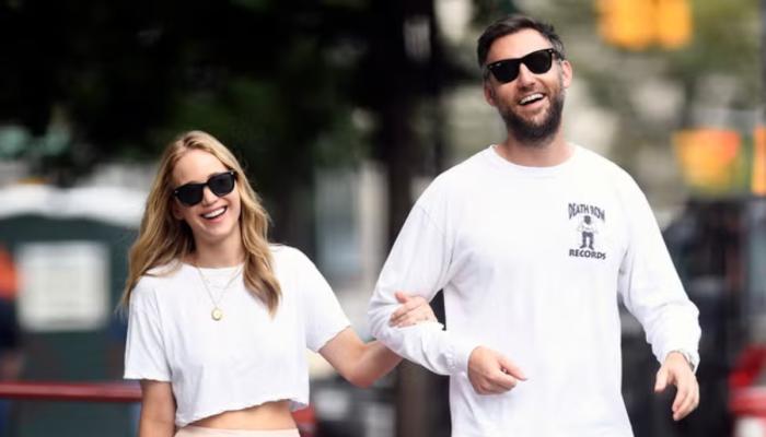 Jennifer Lawrence, Cooke Maroney share a romantic red carpet moment