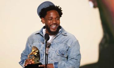 Kendrick Lamar pauses concert to share special moment with young fan