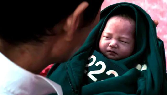How did Jun-hees baby win the Squid Game?