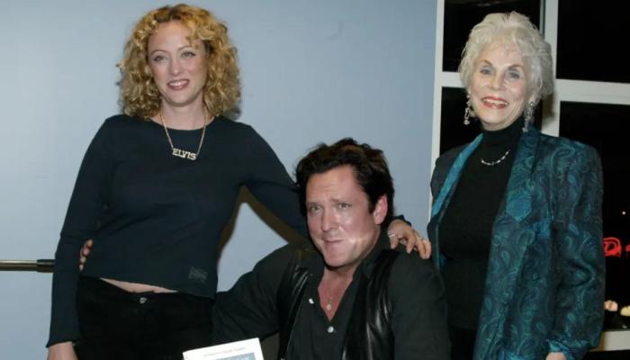 Virginia and Michael alongside their mother Elaine posing at the book signing ceremony Blessing Of The Hounds in 2003