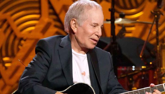 Paul Simon has successful surgery after cancelling shows