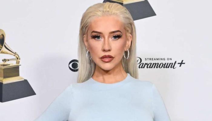 Christina Aguilera makes daring appearance at Burlesque: The Musical event
