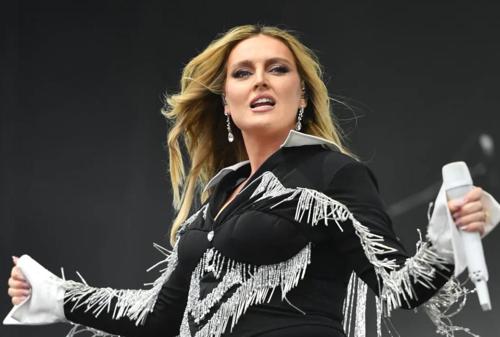 Perrie Edwards stuns on stage after Zayn confession