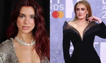 Adele spotted gushing over Dua Lipa at show