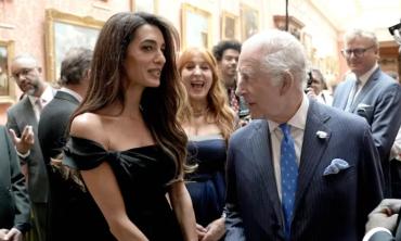 Royal fans up in arms over Amal Clooney's 'disrespectful' move towards King Charles