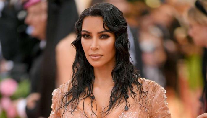 Kim Kardashian takes naked dress trend to new heights