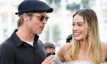 Margot Robbie gets sued for kissing Brad Pitt?