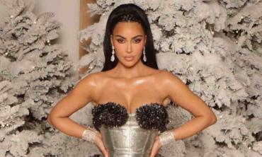 Kim Kardashian brings old Hollywood glam at family Christmas eve bash