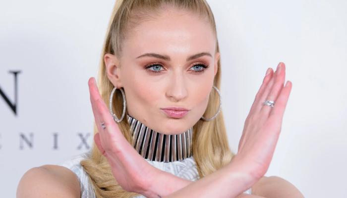 Sophie Turner arrives in high fashion amid Tomb Raider prep
