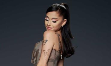 Ariana Grande hints at new album under hilarious photo shop fail post