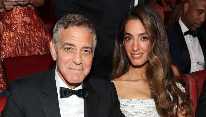 George and Amal Clooney turn heads in Milan on Winter Olympics arrival