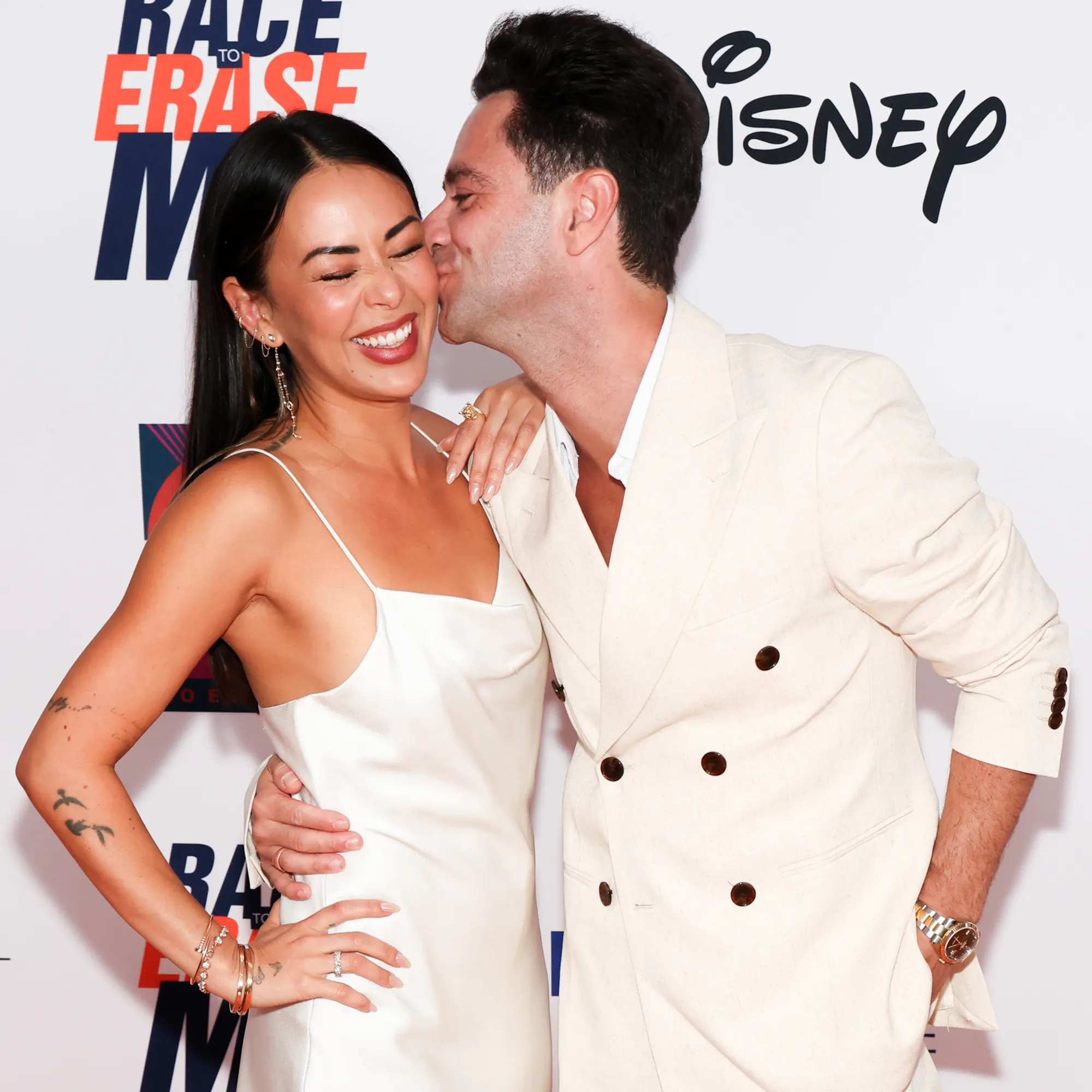 Janel Parrish, Sasha Farber pack on PDA at glam LA gala