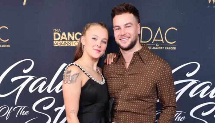 JoJo Siwa and Chris Hughes spark engagement buzz after romantic moment