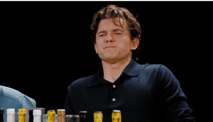 Tom Holland vomits on-camera after eating super spicy wings