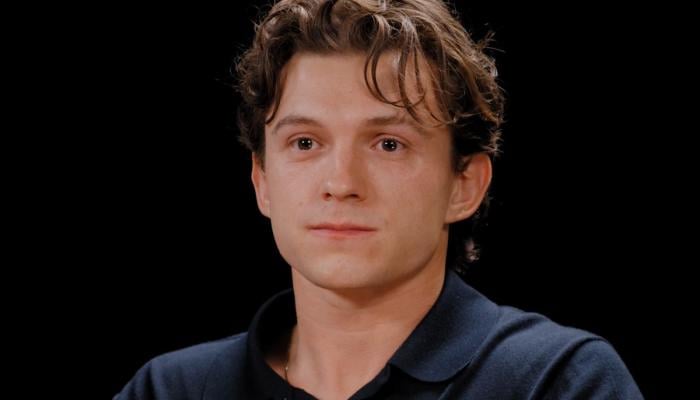 Tom Holland vomits on camera after eating super spicy wings